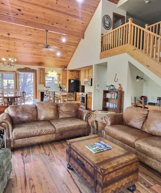 War Eagle Lake House Living Room Sofas & Stairs to Loft