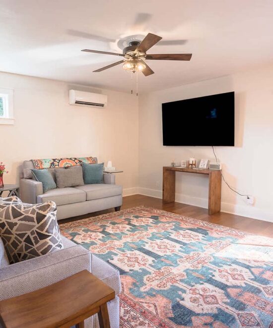 Hosted Journey Haven Suites Back Living Room & TV