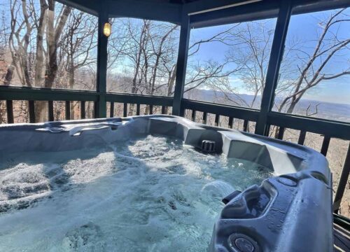 Tranquil Mountain Retreat screened in, outdoor hot tub with a view